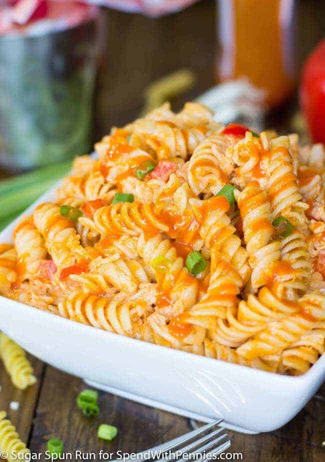 White bowl full of buffalo chicken pasta salad