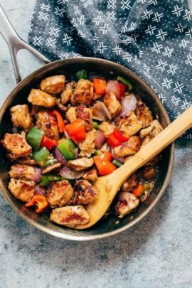 Pepper Chicken Stir Fry in a stainless steel pan