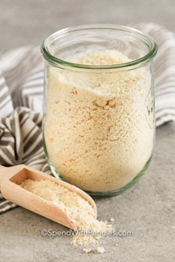 Glass jar of Breadcrumbs with a scoop