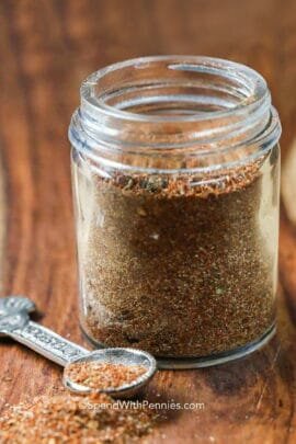 jar of Homemade Taco Seasoning Mix with a spoon full